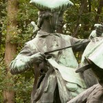 Denkmal "Hasenhetze um 1750" im Großen Tiergarten in Berlin-Mitte von Max Baumbach von 1904, Detailansicht des Jagdgehilfen