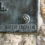 Künstler-Signet von Gustav Eberlein